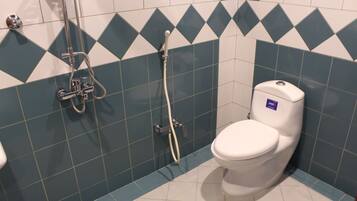 Deluxe Studio | Bathroom | Hair dryer, towels