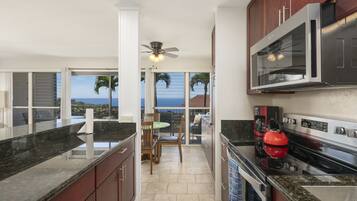 Condo, 2 Bedrooms | Private kitchen | Fridge, oven, coffee/tea maker, toaster