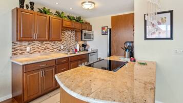 Condo, 2 Bedrooms | Private kitchen | Fridge, oven, coffee/tea maker, toaster