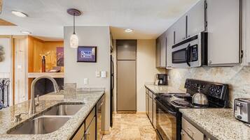 Condo, 2 Bedrooms | Private kitchen | Fridge, coffee/tea maker, toaster