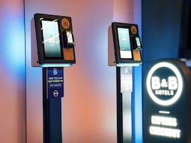 Check-in/check-out kiosk