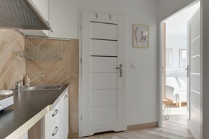 Apartamento conforto | Cozinha americana privada | Cafeteira/chaleira, chaleira elétrica