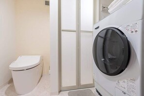 Shower, hair dryer, shampoo