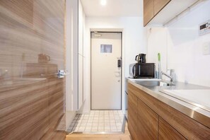 Fridge, microwave, electric kettle, cookware/dishes/utensils