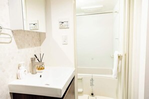 Shower, hair dryer, shampoo