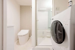 Shower, hair dryer, shampoo