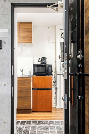 Fridge, microwave, cookware/dishes/utensils
