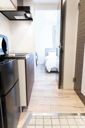1 chambre, fer et planche à repasser, Wi-Fi, literie fournie
