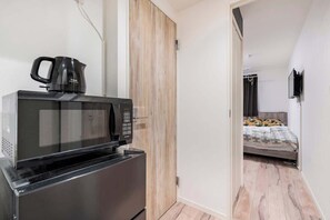 1 chambre, fer et planche à repasser, Wi-Fi, literie fournie
