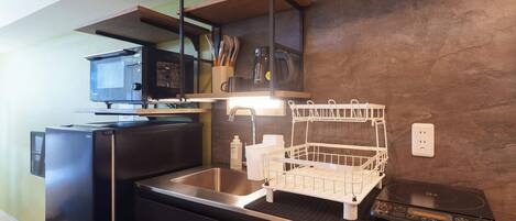 Fridge, microwave, stovetop, cookware/dishes/utensils