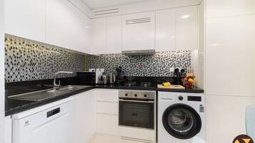 Luxury Apartment, Balcony, Sea View | Iron/ironing board, cribs/infant beds, free WiFi, bed sheets