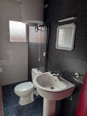 Shower, towels, soap, shampoo