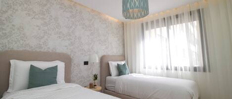 2 chambres, fer et planche à repasser, accès Internet, draps fournis