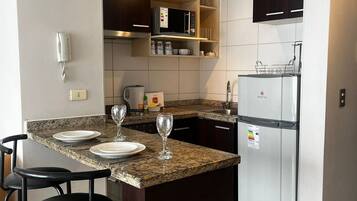 Apartemen | Dapur pribadi | Lemari es, microwave, oven, dan kompor