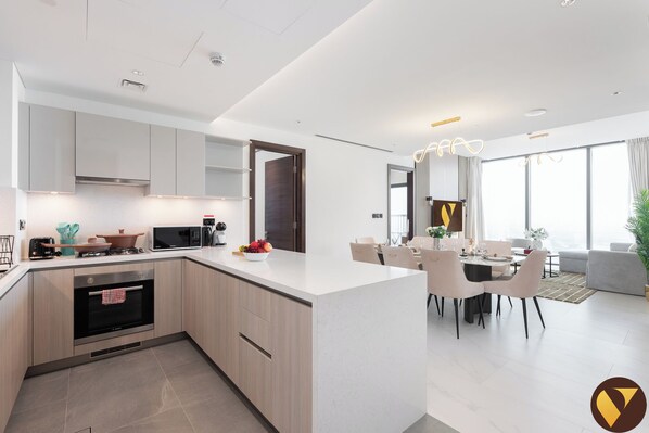 Luxury Apartment, Balcony, City View | Private kitchen | Full-sized fridge, microwave, oven, stovetop