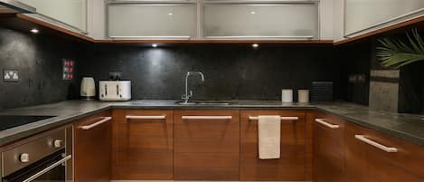 Apartment | Private kitchen | Fridge, microwave, oven, stovetop