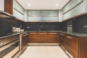 Apartment | Private kitchen | Fridge, microwave, oven, stovetop