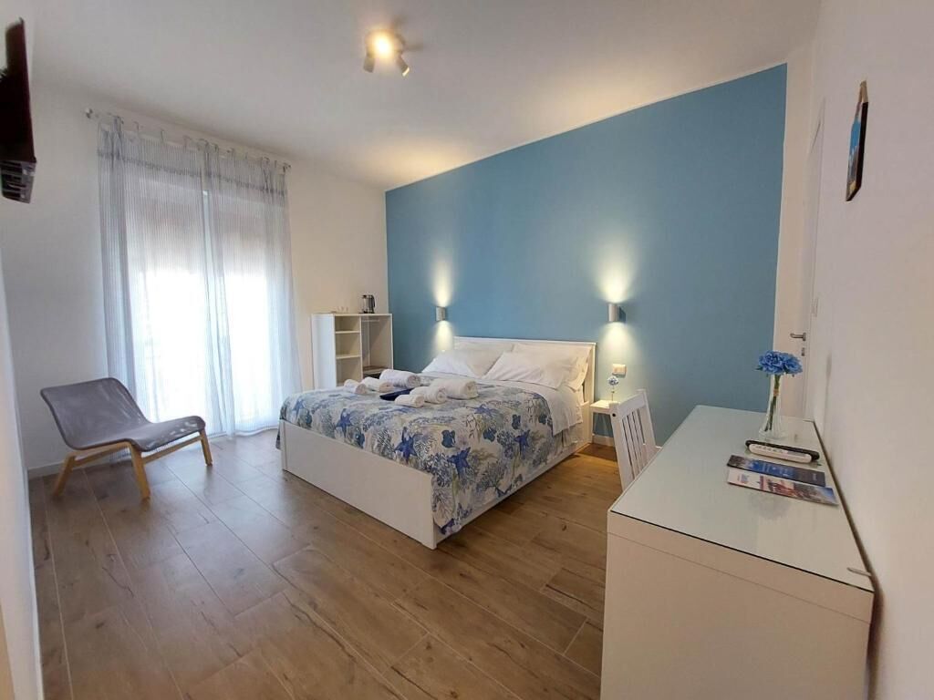 Double Room | Iron/ironing board, free cots/infant beds, free WiFi, bed sheets