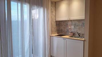 Monolocale, balcone, vista parco | Cucina privata