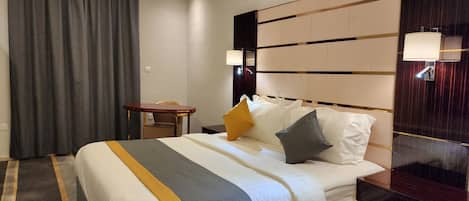 Premium bedding, memory-foam beds, in-room safe, blackout curtains