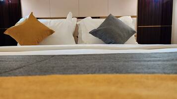 Premium bedding, memory foam beds, in-room safe, blackout drapes