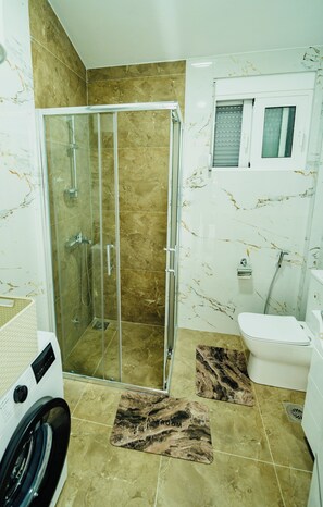 Hair dryer, towels, soap, toilet paper