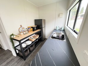 Fridge, microwave, toaster, cookware/dishes/utensils