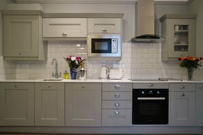 Fridge, microwave, oven, stovetop - Apartment 5 - The Promenade (Southport)