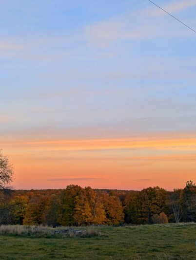 Country charm, quiet hideaway. Country, quiet setting.
