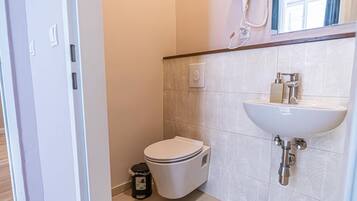 Hair dryer, towels, soap, shampoo
