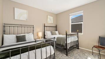 House, Multiple Beds, Patio, Garden View (921 Birchdale Court) | 4 bedrooms, individually decorated, individually furnished, bed sheets