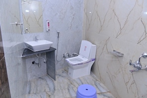 Shower, slippers, towels, soap