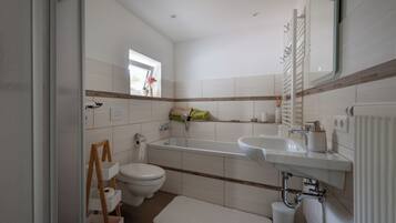 Hair dryer, towels, soap, toilet paper