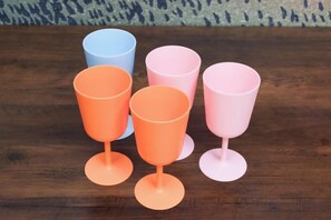 Four glass cups on a wooden surface. - Comfort Hasunuma (Tokyo)