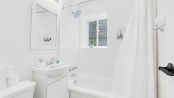 Hair dryer, towels, soap, toilet paper