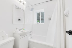 Hair dryer, towels, soap, toilet paper