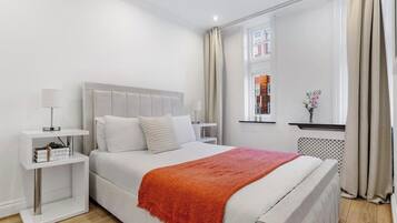 Apartamento Deluxe, vistas a la ciudad | Tabla de planchar con plancha y wifi gratis