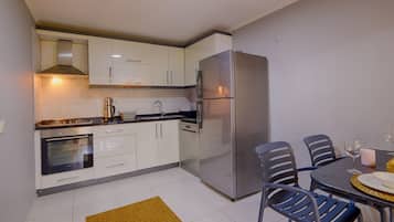 Family Condo, 2 Bedrooms, Kitchen, City View | Private kitchen | Fridge, oven, stovetop, dishwasher