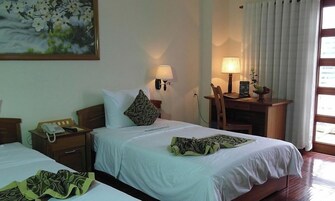 Habitación Deluxe | Cortinas opacas, tabla de planchar con plancha, wifi gratis