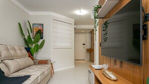 Living area - WI-FI 700MB | Swimming pool | Barbecue grill #IA34 (Florianópolis)