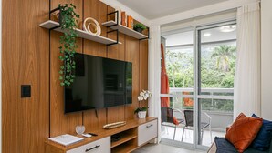 Living area - WI-FI 700MB | Swimming pool | Barbecue grill #IA34 (Florianópolis)