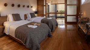 Luxury Suite, Balcony, City View | In-room safe, individually decorated, individually furnished