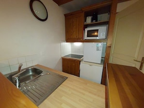 Refrigerador, microondas, parrilla de estufa y lavavajillas 