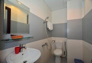 Habitación Deluxe con 1 cama doble o 2 individuales | Baño