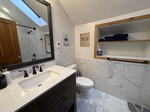 Hair dryer, towels, soap, shampoo