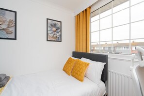 4 dormitorios, tabla de planchar con plancha, wifi gratis y ropa de cama