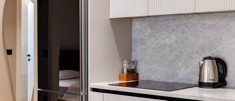Departamento Deluxe | Cocina privada | Refrigerador