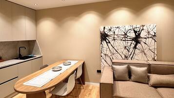 Deluxe Apartment | Living area | 40-cm Smart TV with digital channels