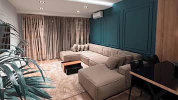 Lägenhet Deluxe | Vardagsrum | 40-centimeters smart-tv med digitalkanaler