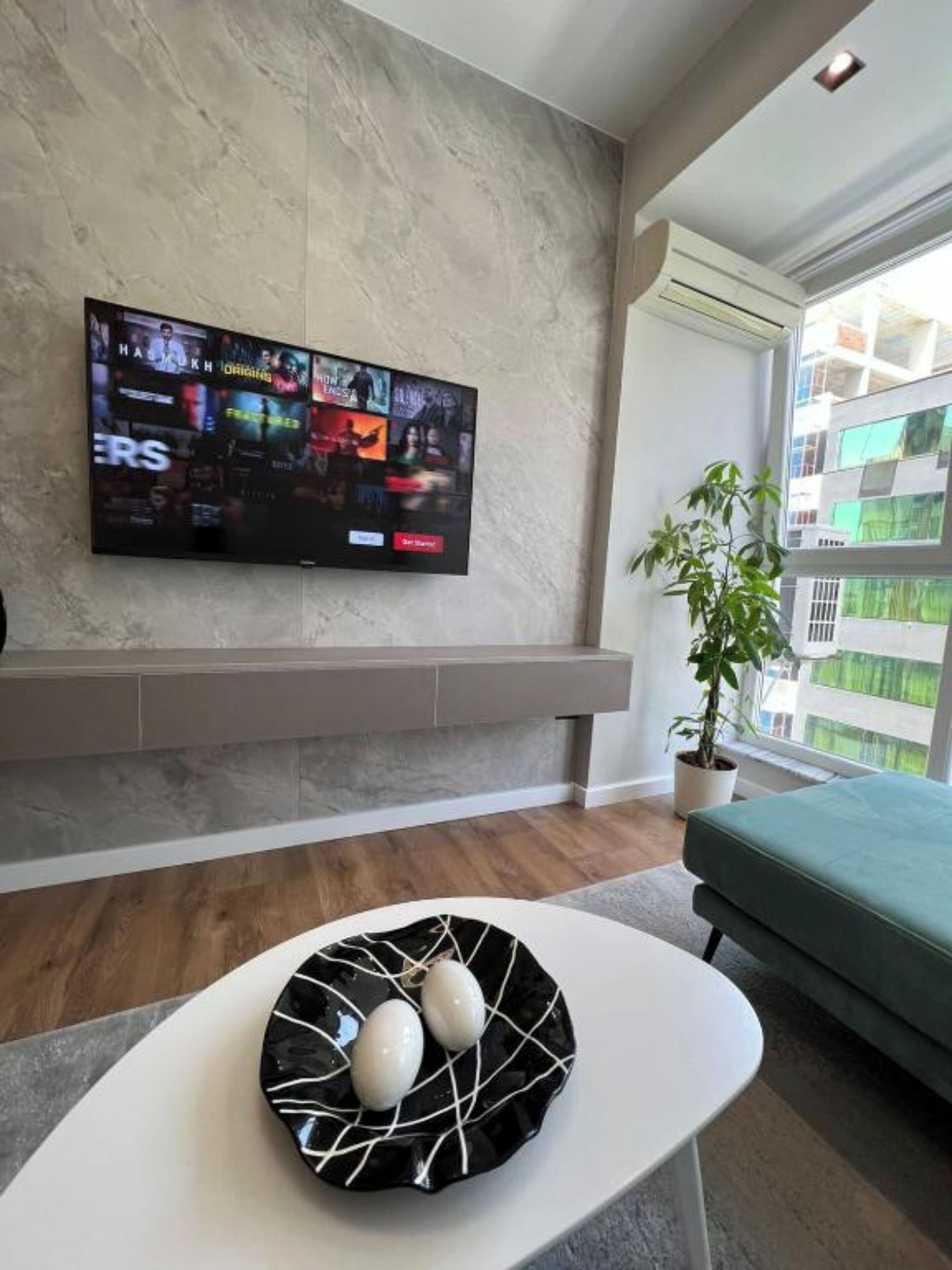 Deluxe Apartment | Living area | 40-cm Smart TV with digital channels